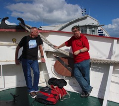 Ray Reynolds and Chris dance around their handbags